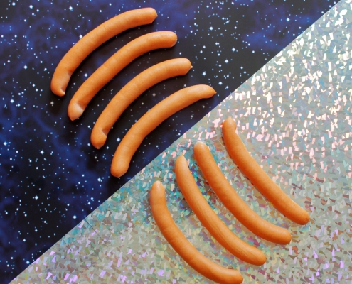 Vier Wiener auf glänzend silber Hintergrund und 4 Wiener auf Weltraum Hintergrund